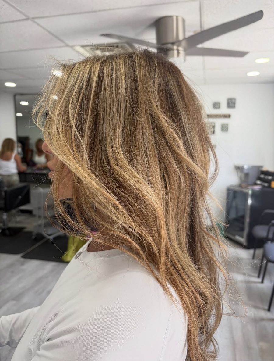Long layered honey blonde hair extensions